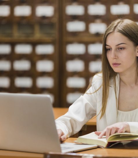 back-school-concept-with-woman-studying-library