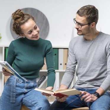 medium-shot-smiley-friends-with-books